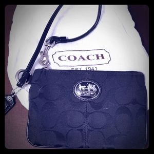 Black coach wristlet with dustbag
